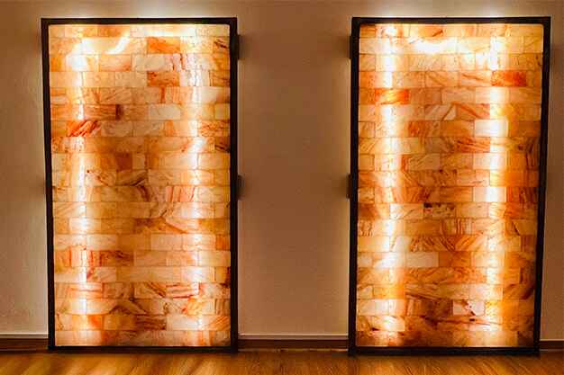 A salt heat therapy wall at Sky Yoga studio in Tanjong Katong, Singapore, offering unique wellness benefits such as enhanced relaxation, detoxification, and improved respiratory health.