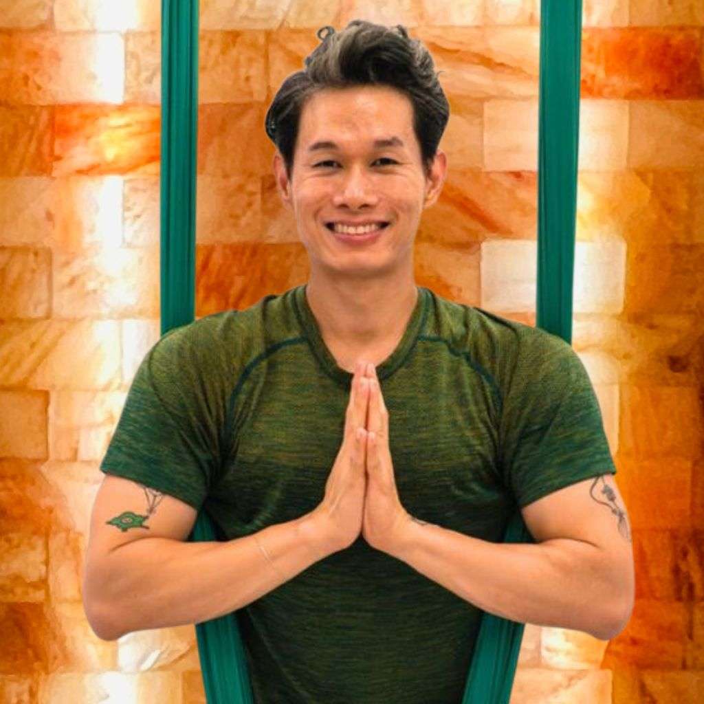 Ming aerial yoga instructor